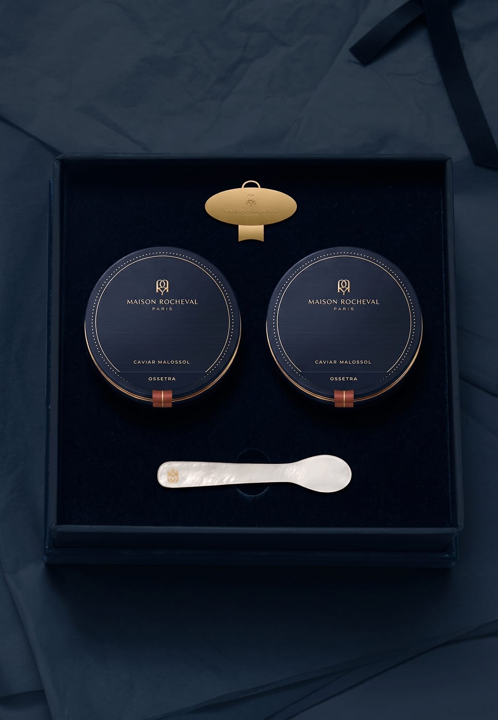 Chef preparing a tin of caviar