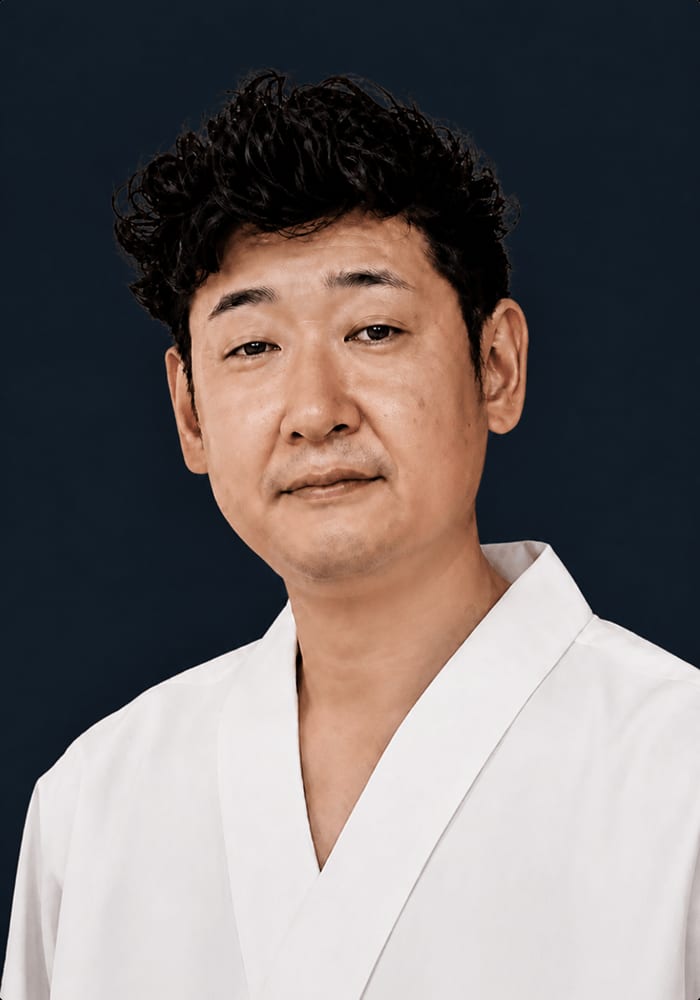 Portrait of Chef Yoshio Sakuta of Sushi Sakuta