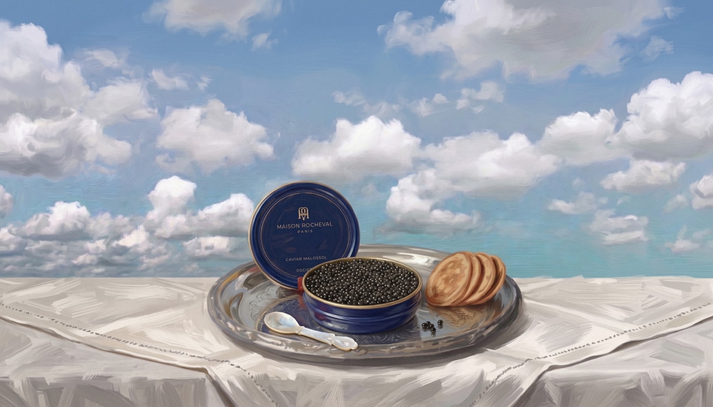 A painted still life of an open tin of Maison Rocheval caviar and blini on a silver tray, set against a painted sky and sea