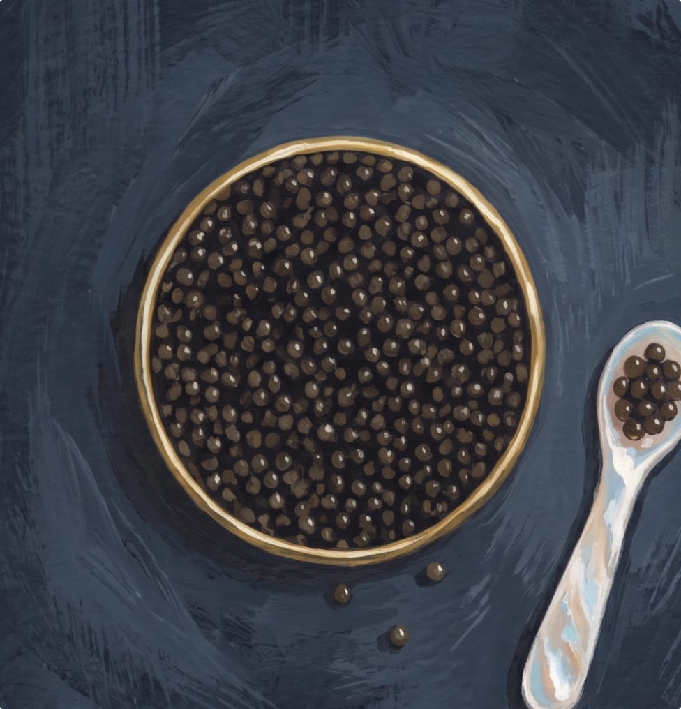 A gilded bowl of caviar beside a mother-of-pearl spoon